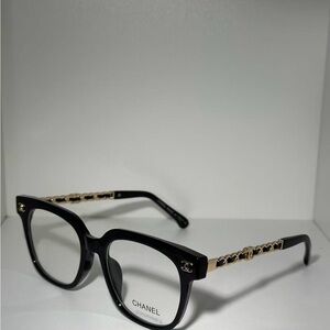 CHANEL Black Frames with Gold Detailing